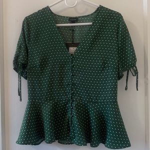 Polka dot tie sleeve button detail peplum top
